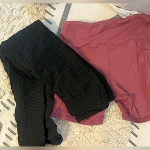 2 pairs of work out bottoms. Black leggings & pink spanks